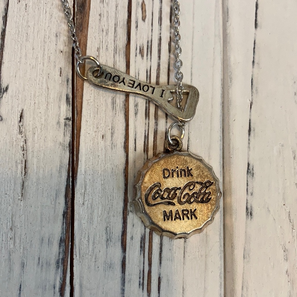 Cute coke cap and bottle cap remover necklace!